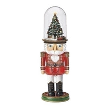 LIGHTED MUSICAL ROTATING
TRAIN IN NUTCRACKER HAT